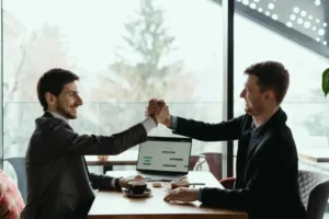 two guys making deal on First-Time Beauty Franchise