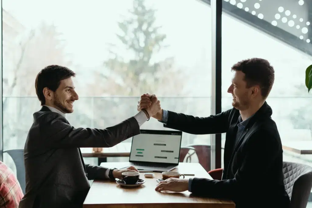 two guys making deal on First-Time Beauty Franchise