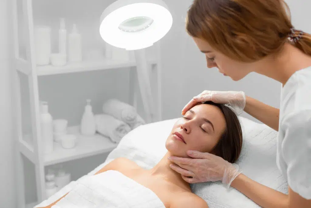 Woman getting a facial treatment with Morpheus8 exosomes