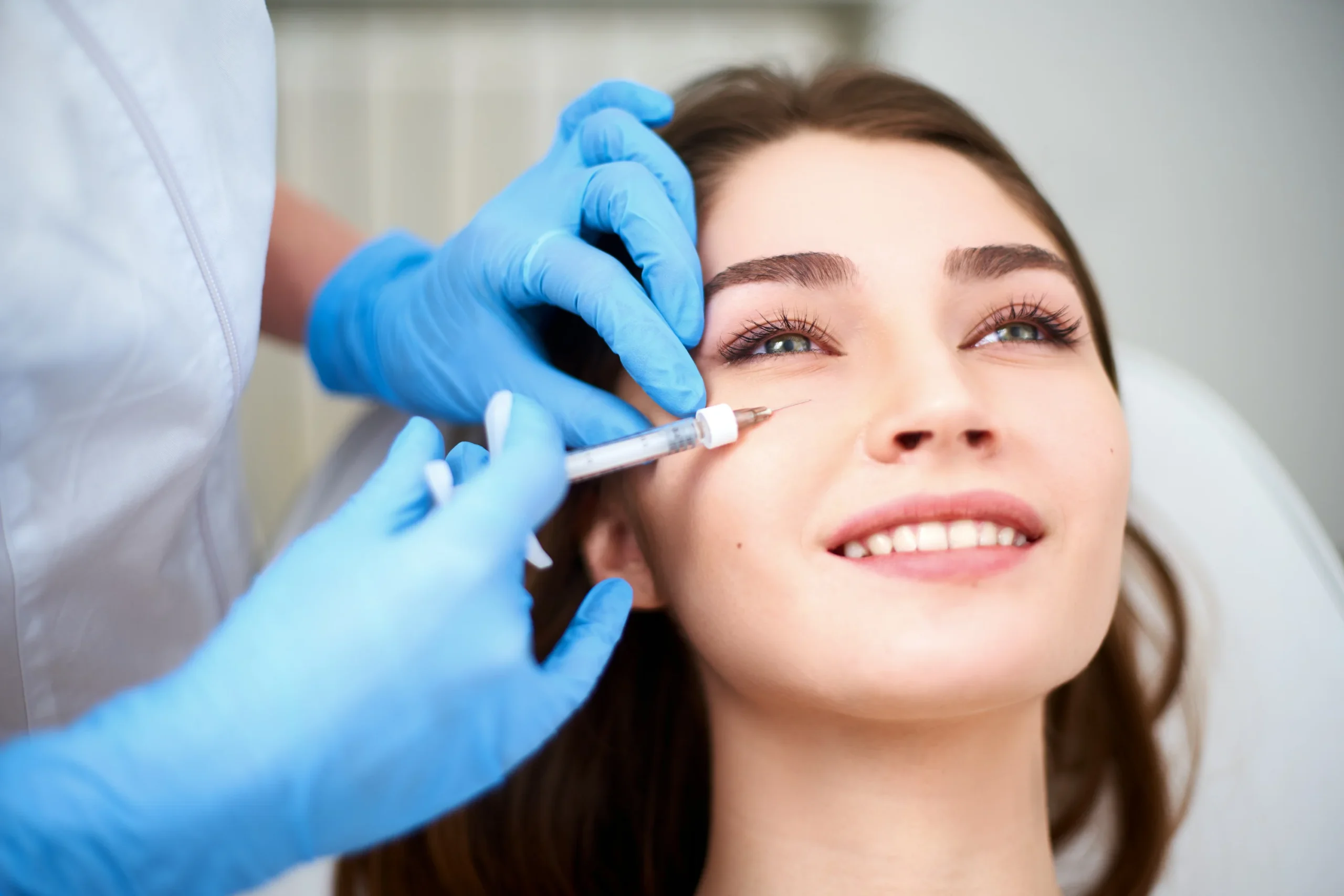 Client receiving dermal fillers in barrie