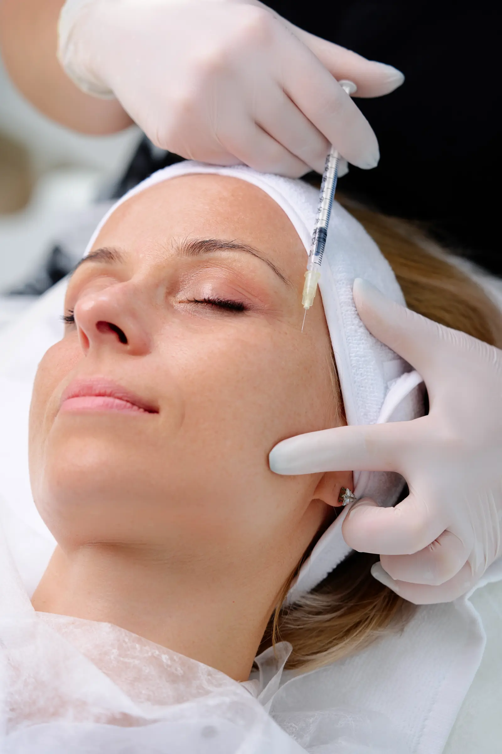 Woman getting botox injections