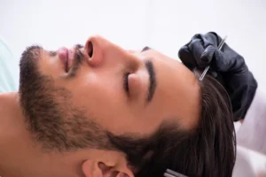 patient getting PRP Hair Restoration Treatment